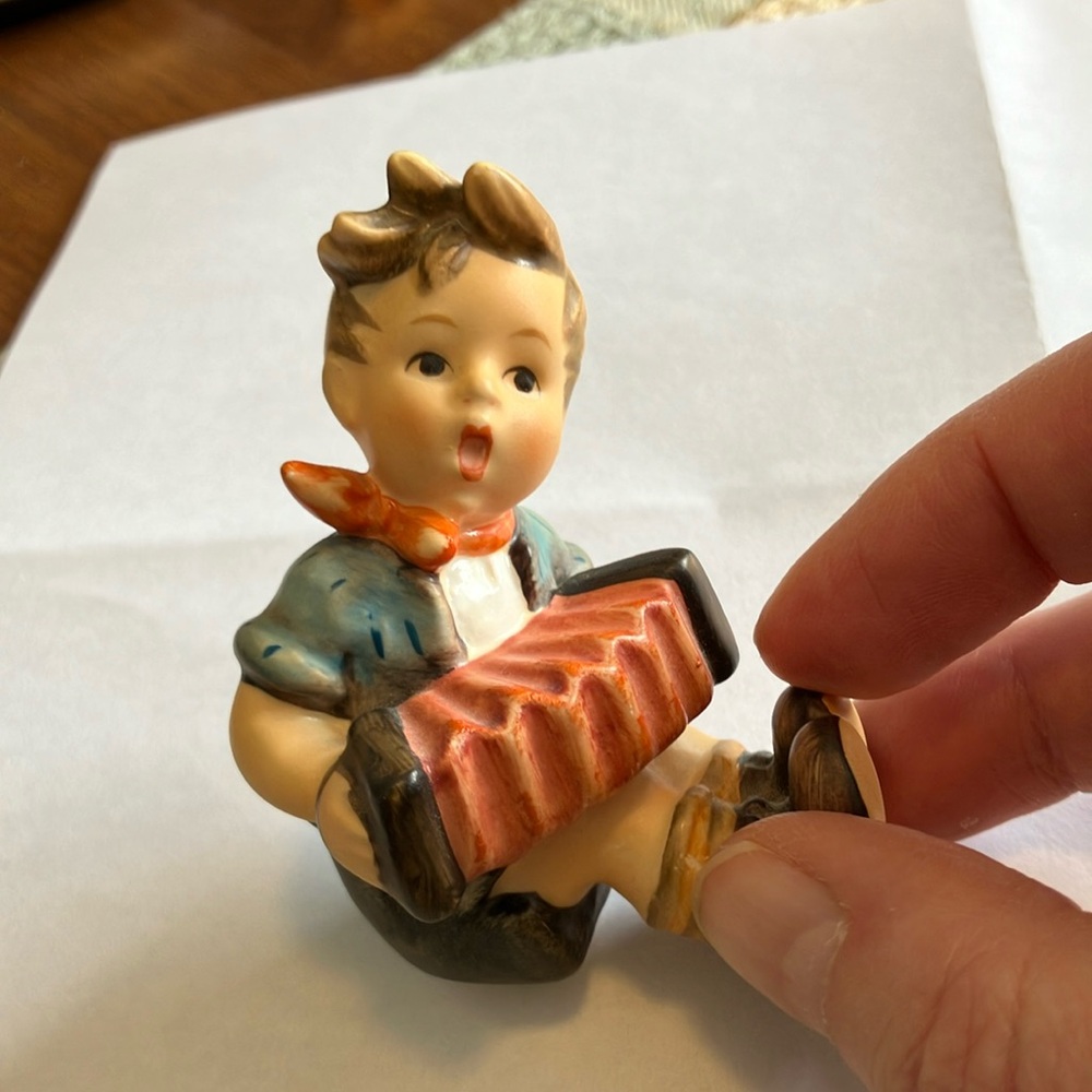 Charming Boy Figurine with Accordion
